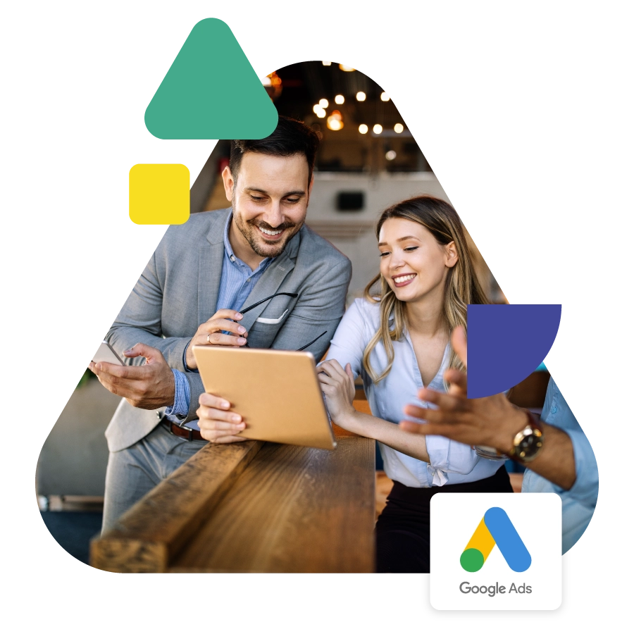 Triangle shape with photo of people on tablet and Google Ads logo