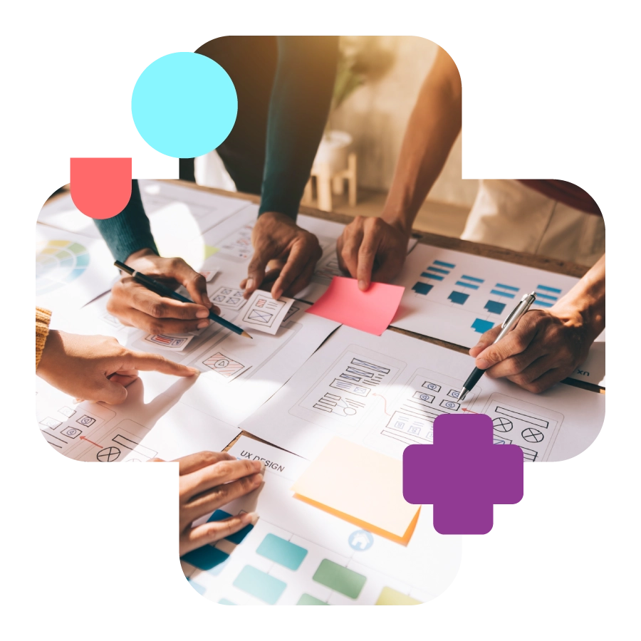 Cross shape with photo of a table with people planning and wireframing to represent branding.